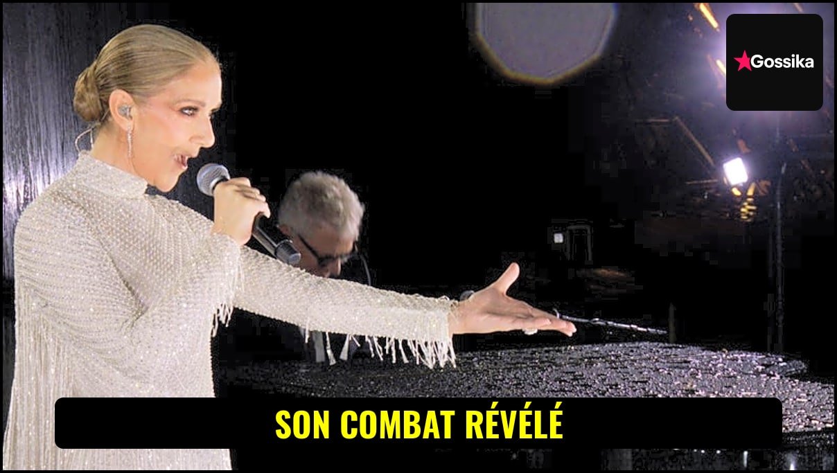 Céline Dion souriante sur scène, micro à la main
